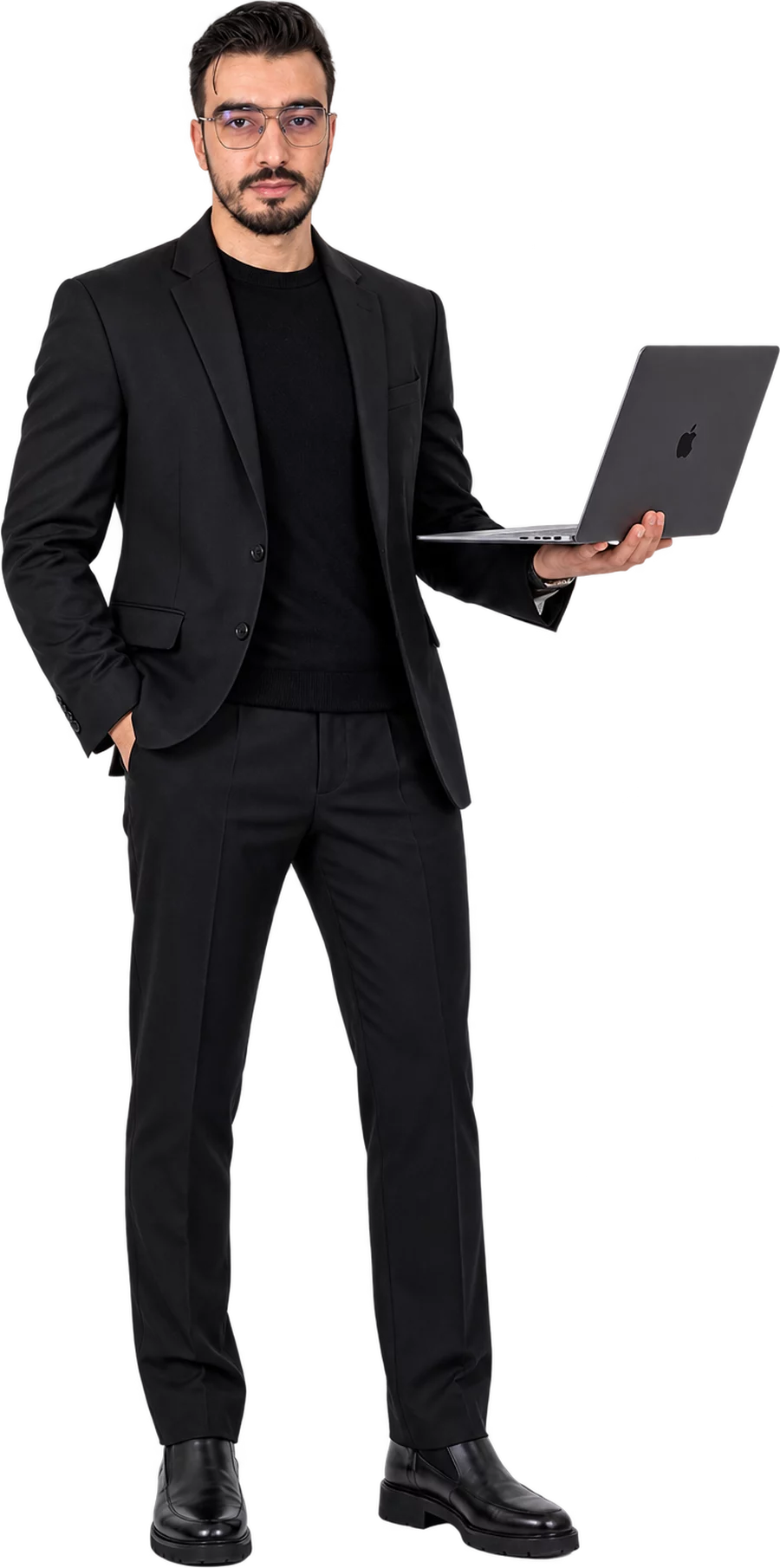 Soufiane Aberbach in a black suit holding an open laptop