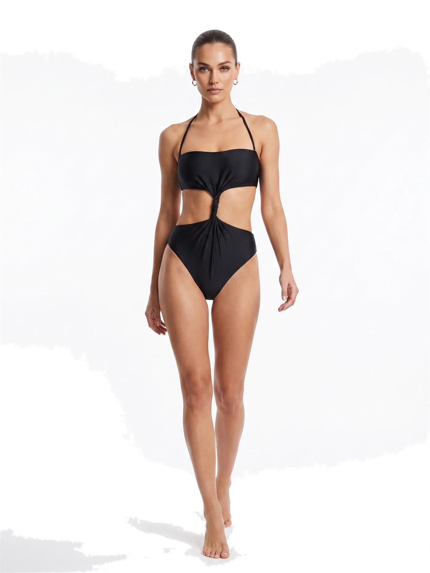 A black bandeau top with a high-waisted brief, photographed on a white studio ground.