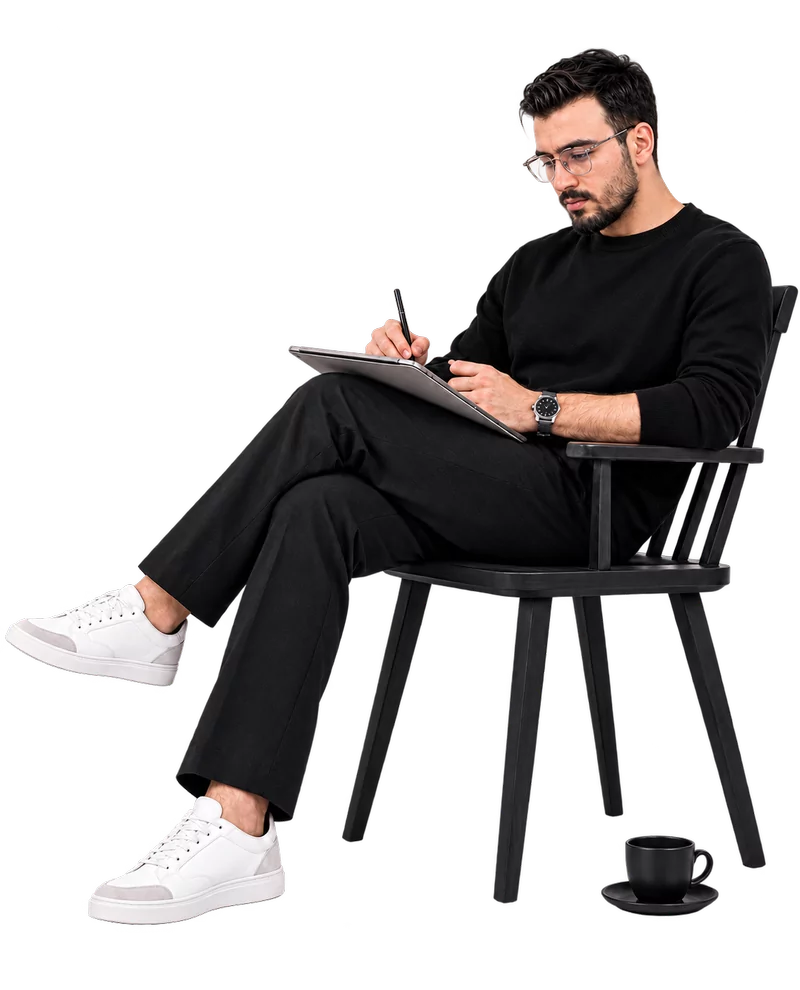Soufiane Aberbach seated and drawing on a tablet